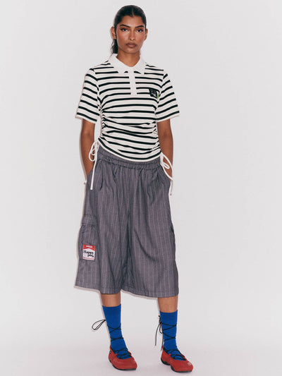 model:Kerethika wears size S and is 5’ 7”