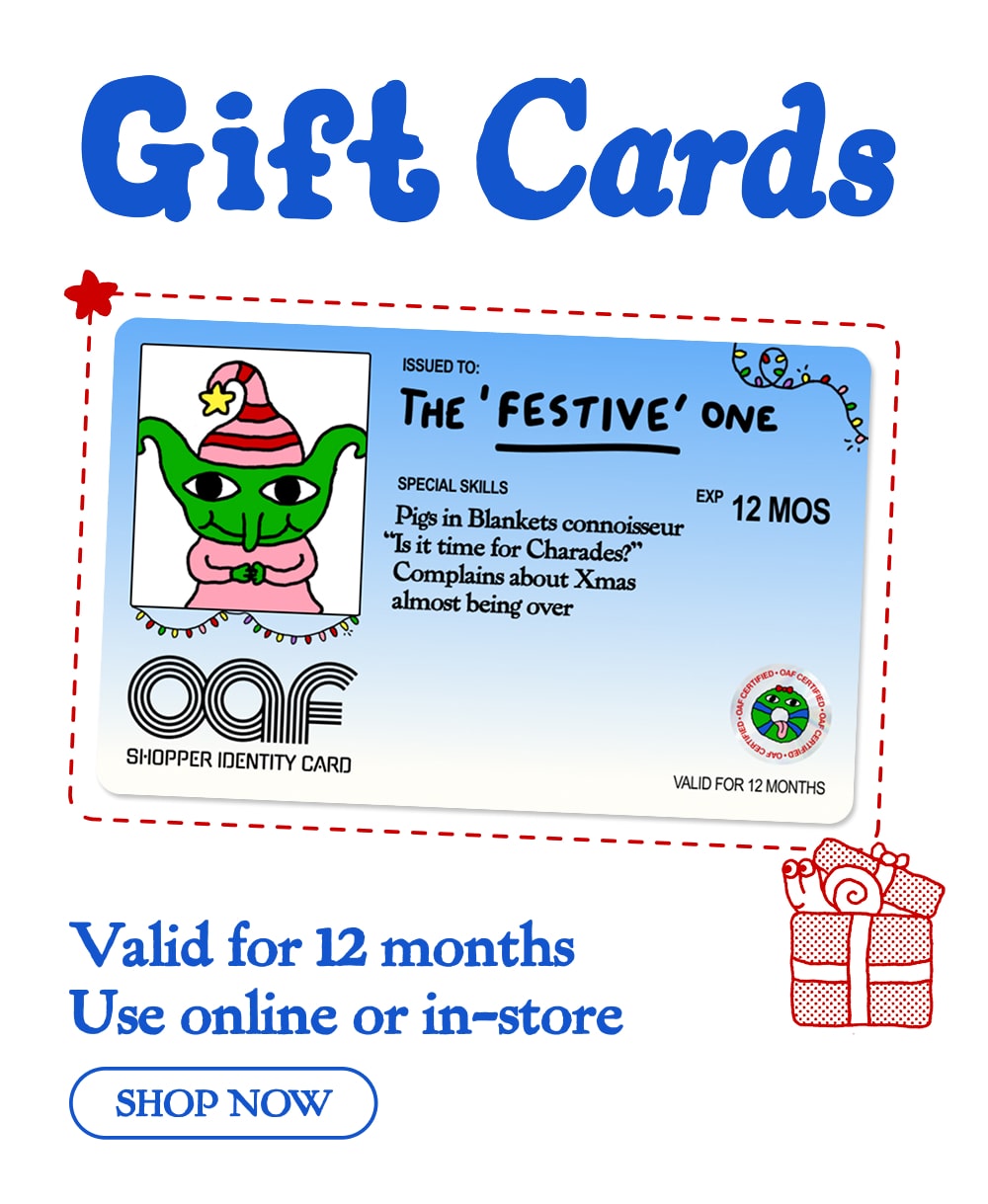 Portrait banner with a white background. On the left, in large blue text, it reads 'Gift Cards'. Below that is a picture of an illustrated gift card. Below that, 'Valid for 12 Months • Use online or in-store' and a button that says 'Shop Now'.
