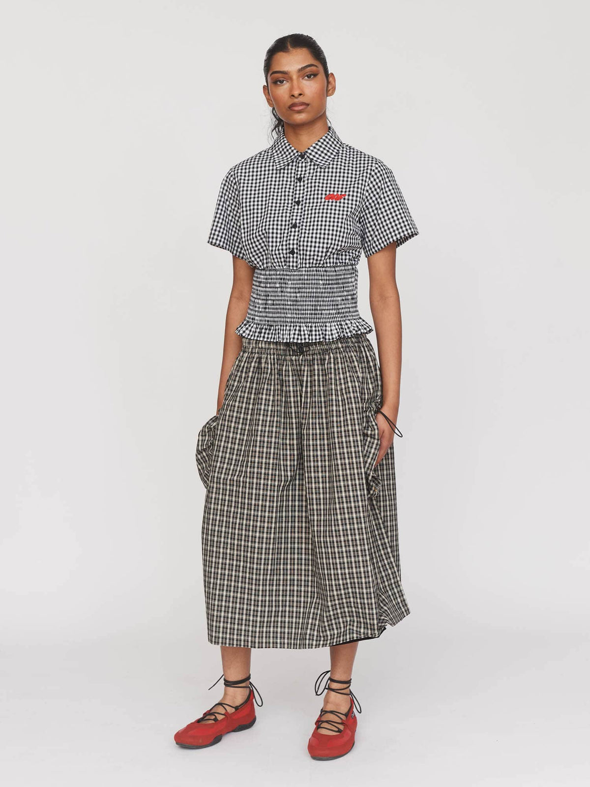 Collection-women-landing, collection-women-new-in-1, collection-womens-skirts, model:Kerethika wears size S and is 5’ 7”