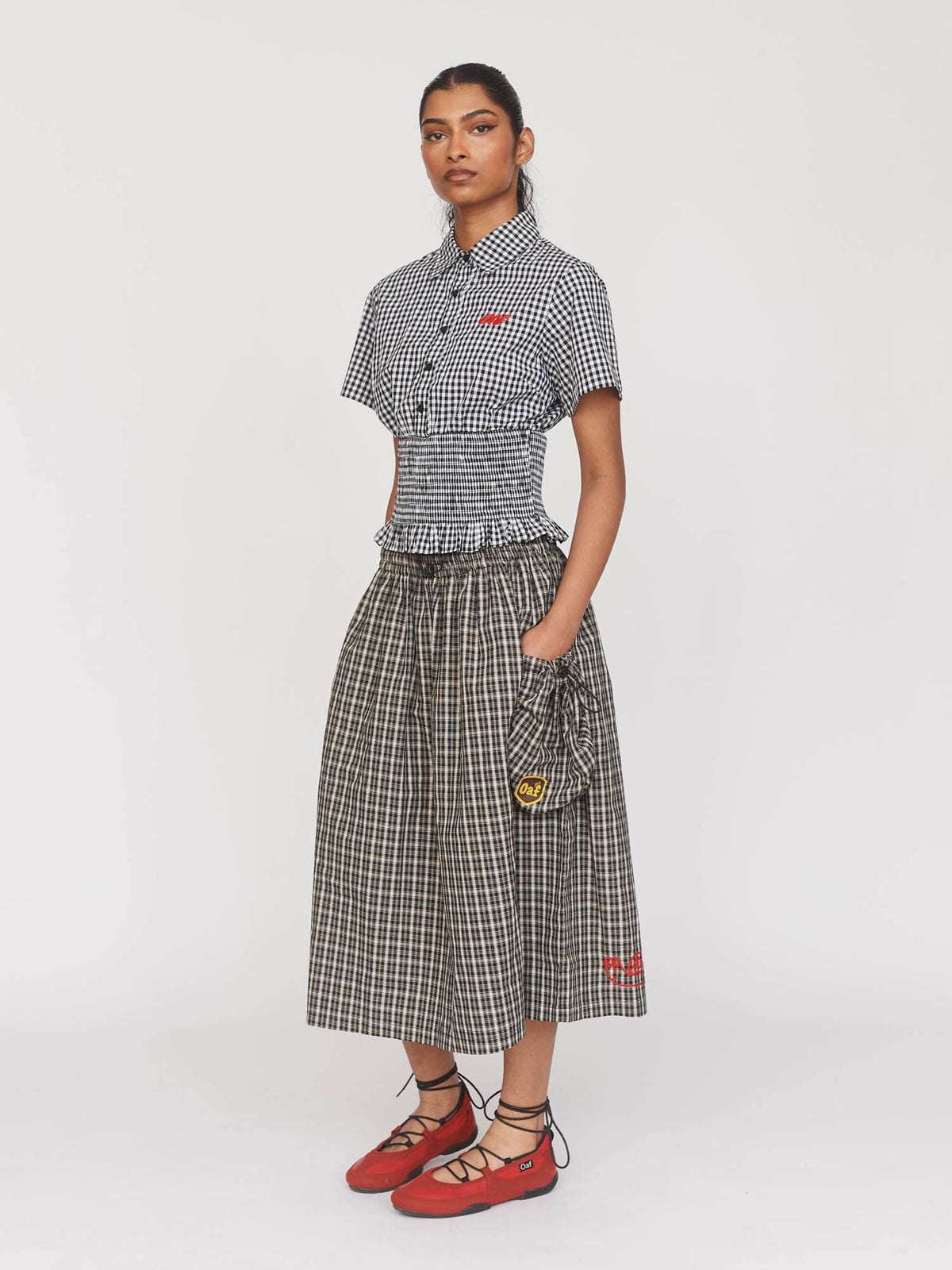 model:Kerethika wears size S and is 5’ 7”,  collection-all-skirts