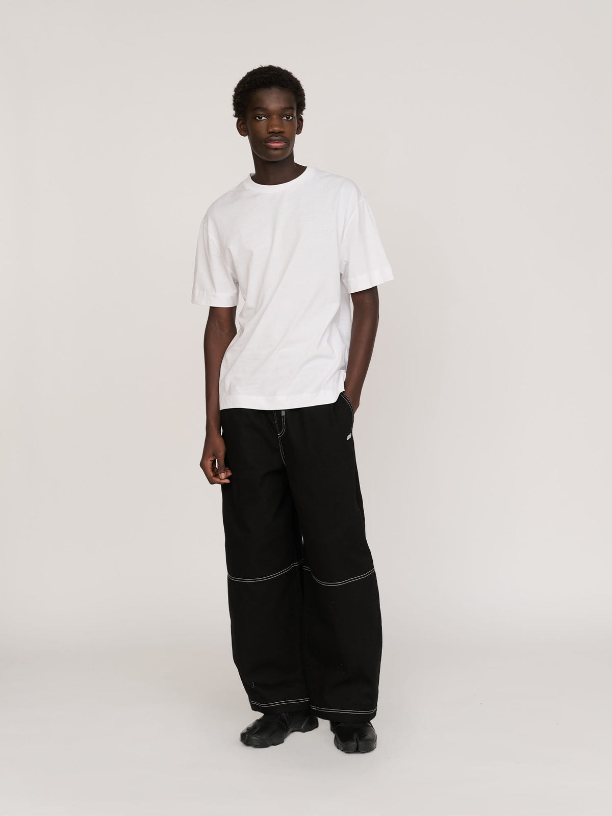 model:Elhadj wears size L and is 6’1”, collection-all-trousers, collection-men