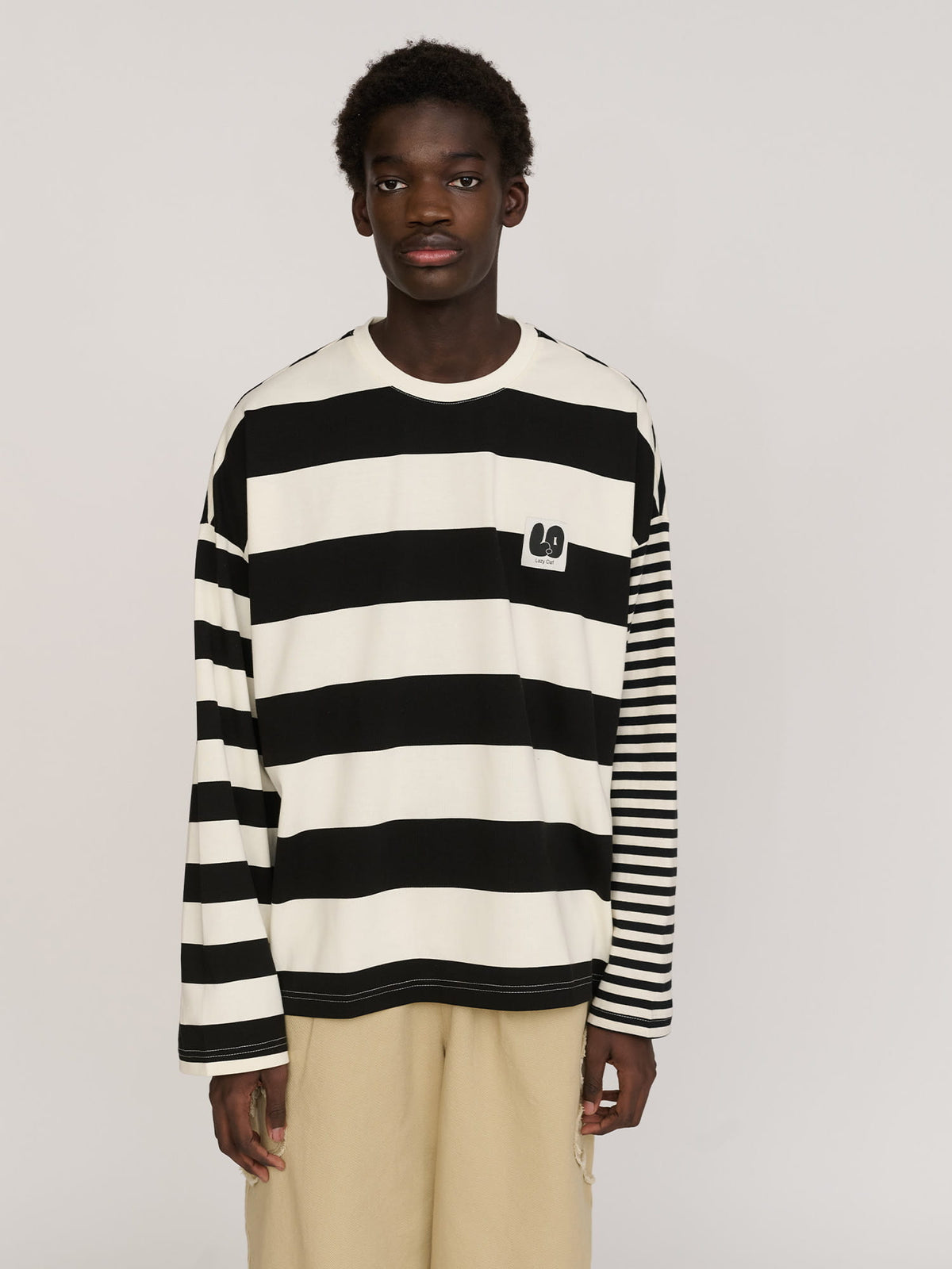 Collection-men-landing, collection-men-new-in-1, collection-men, collection-mens-t-shirts, model:Elhadj wears size L and is 6’1”, collection-mens-happy-sad, collection-mens-layering