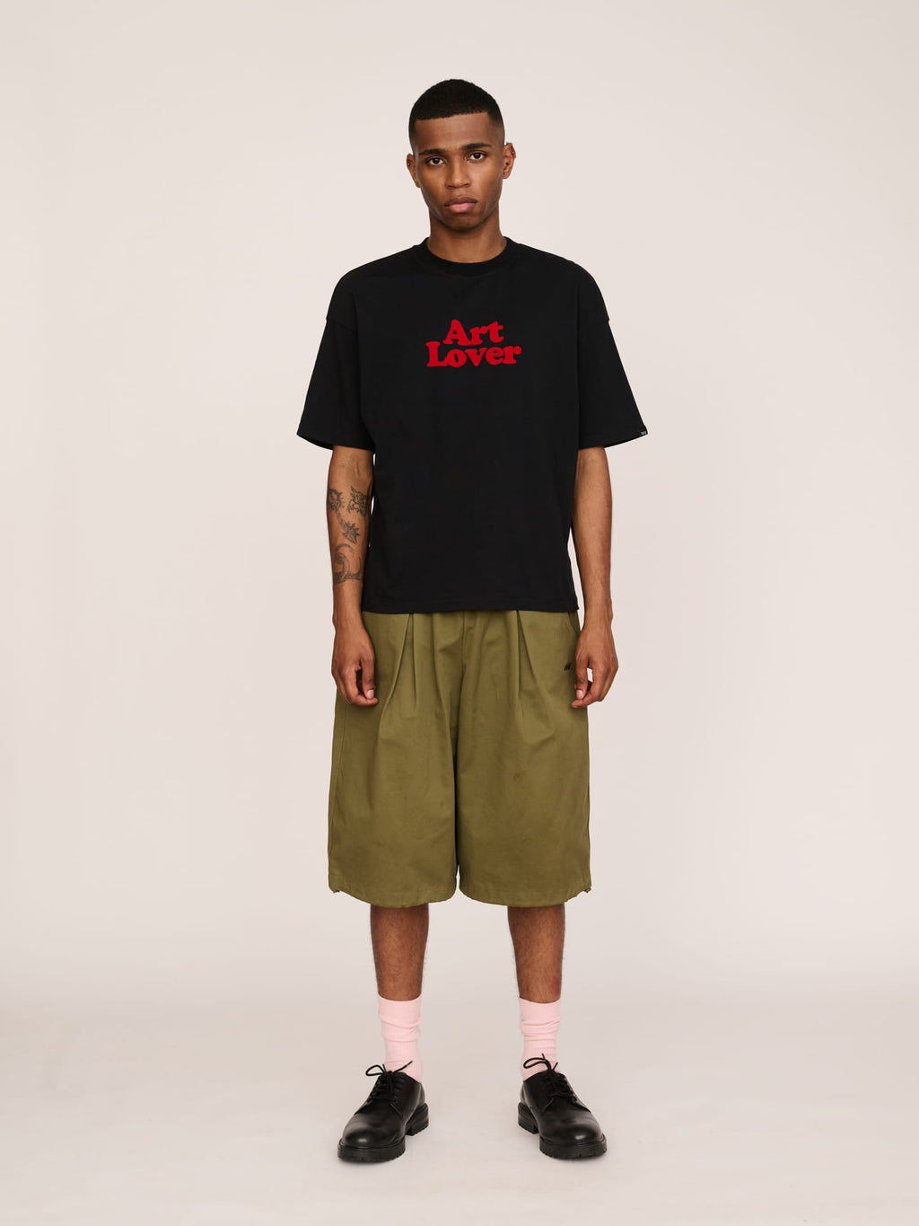 model:Paris wears size L and is 6’2”