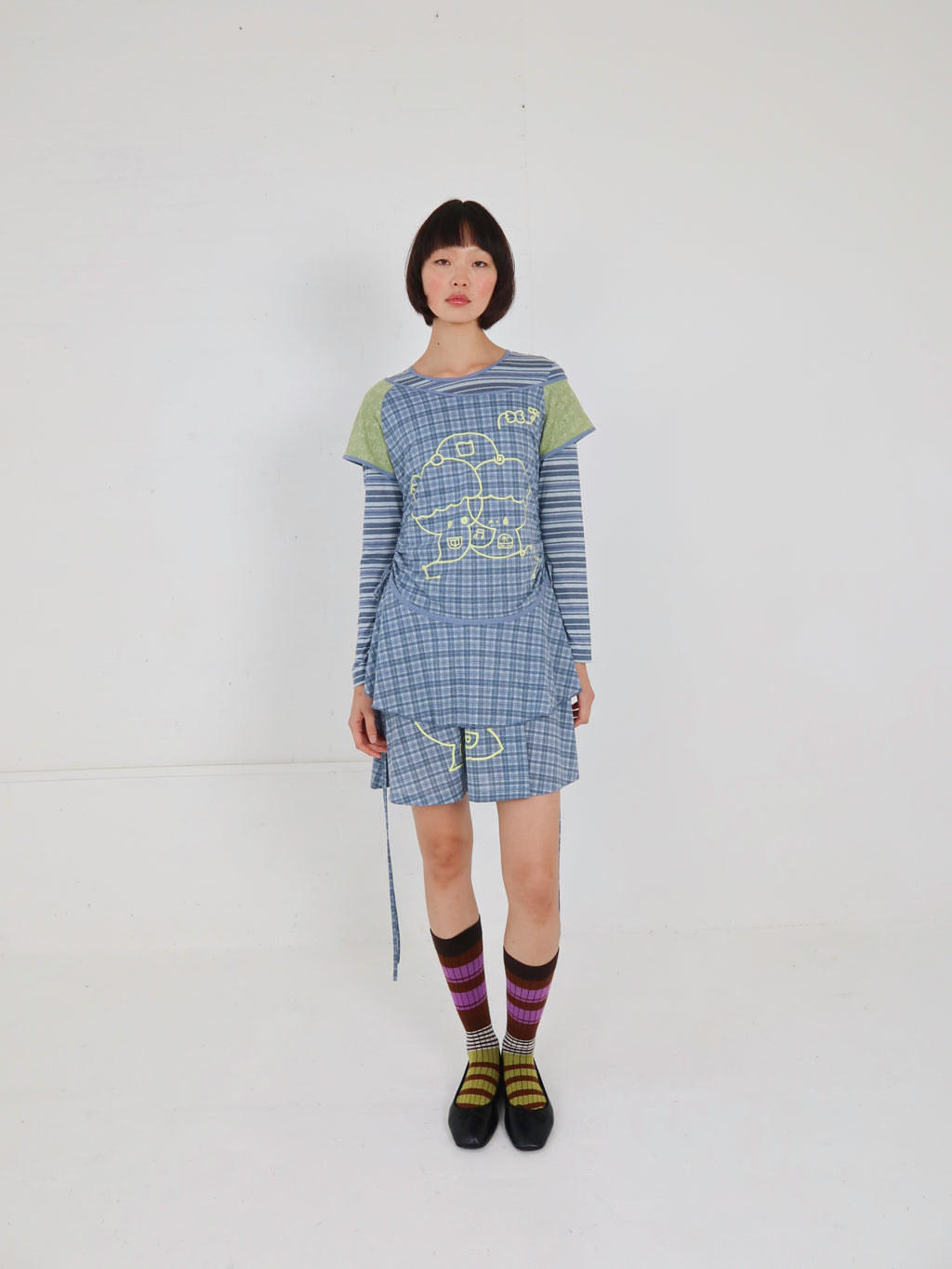 model: Nomin wears size 8 and is 5’10”