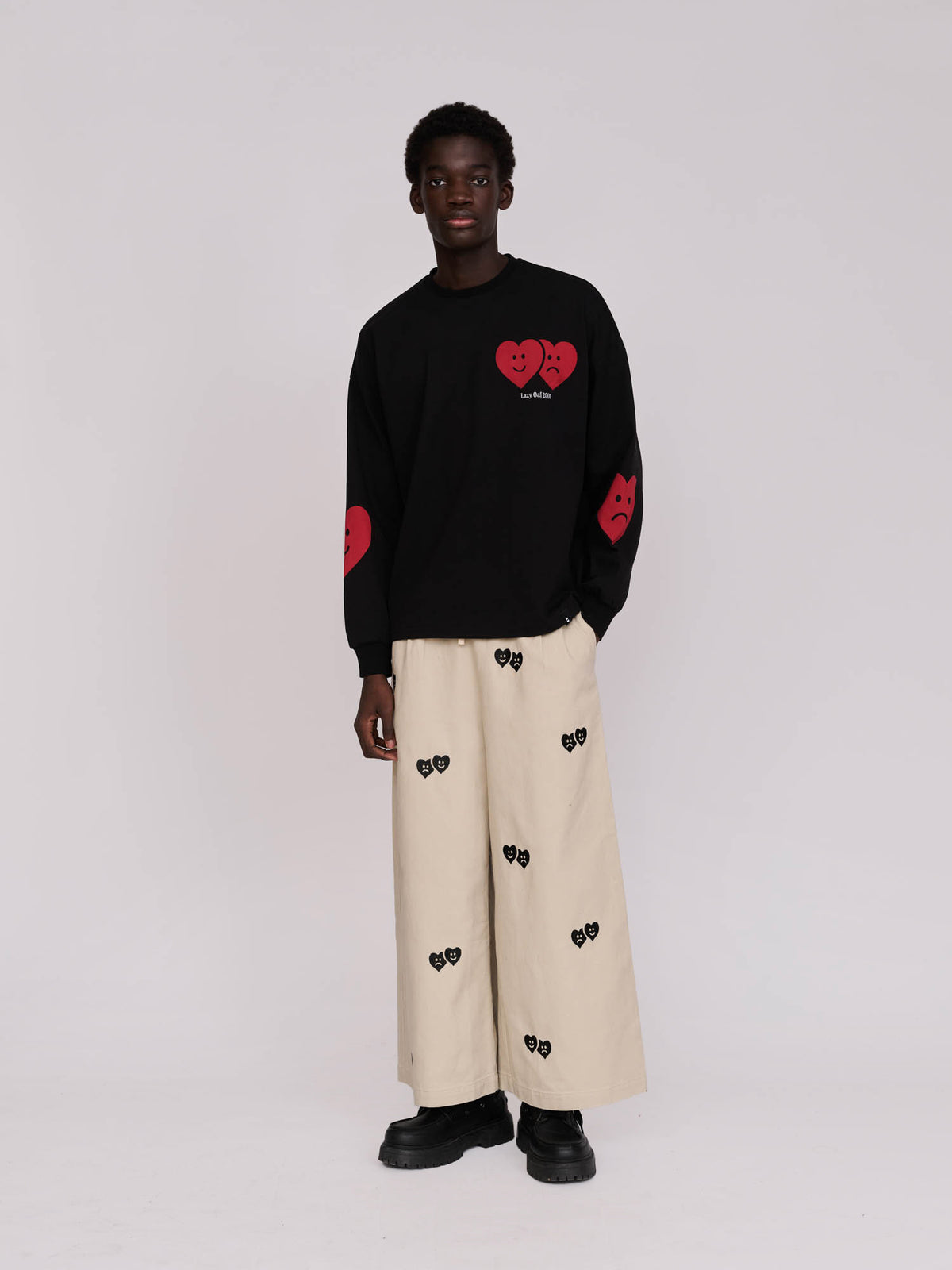 Collection-men-landing, collection-men-new-in-1, collection-men, collection-mens-trousers, model:Elhadj wears size L and is 6’1”, collection-mens-happy-sad